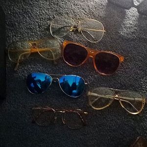 A BUNCH OF VINTAGE SEEING EYEGLASSES AND SOME RAY BANS